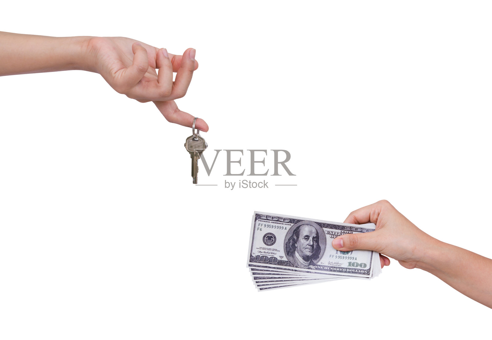 人的手拿着钱和钥匙照片摄影图片