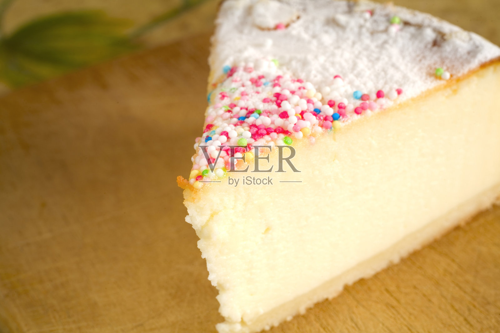 一片芝士蛋糕配照片摄影图片