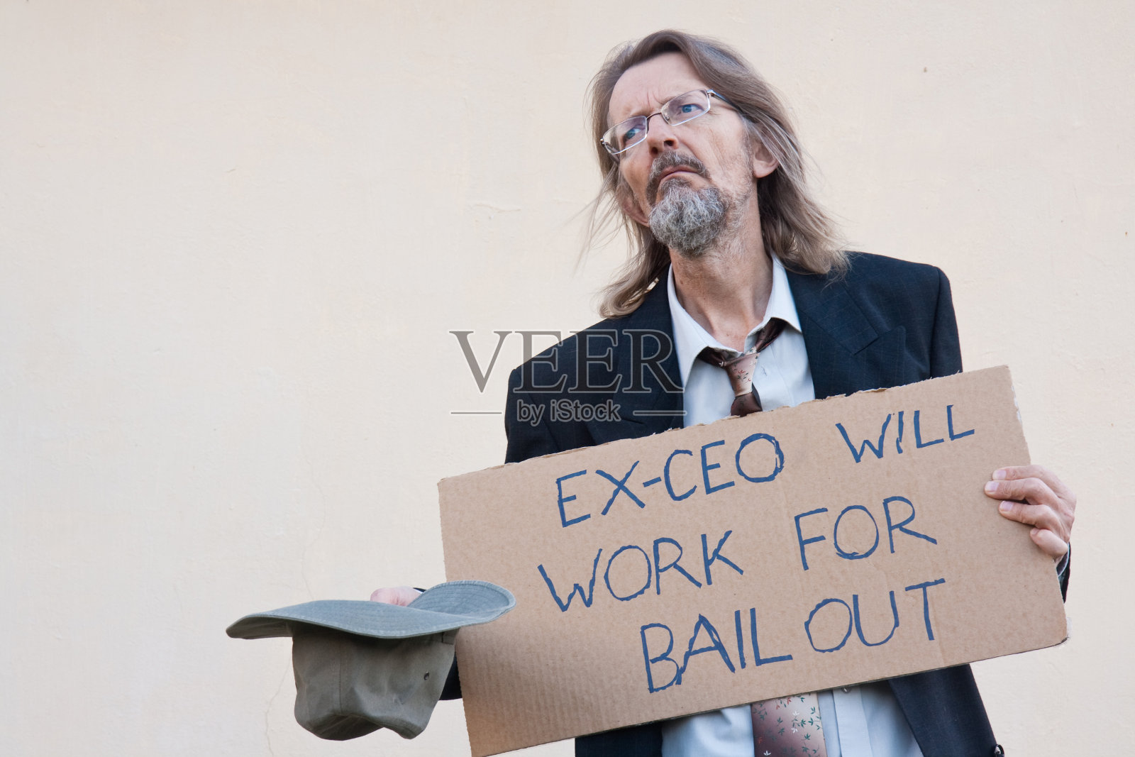 商人乞求施舍照片摄影图片