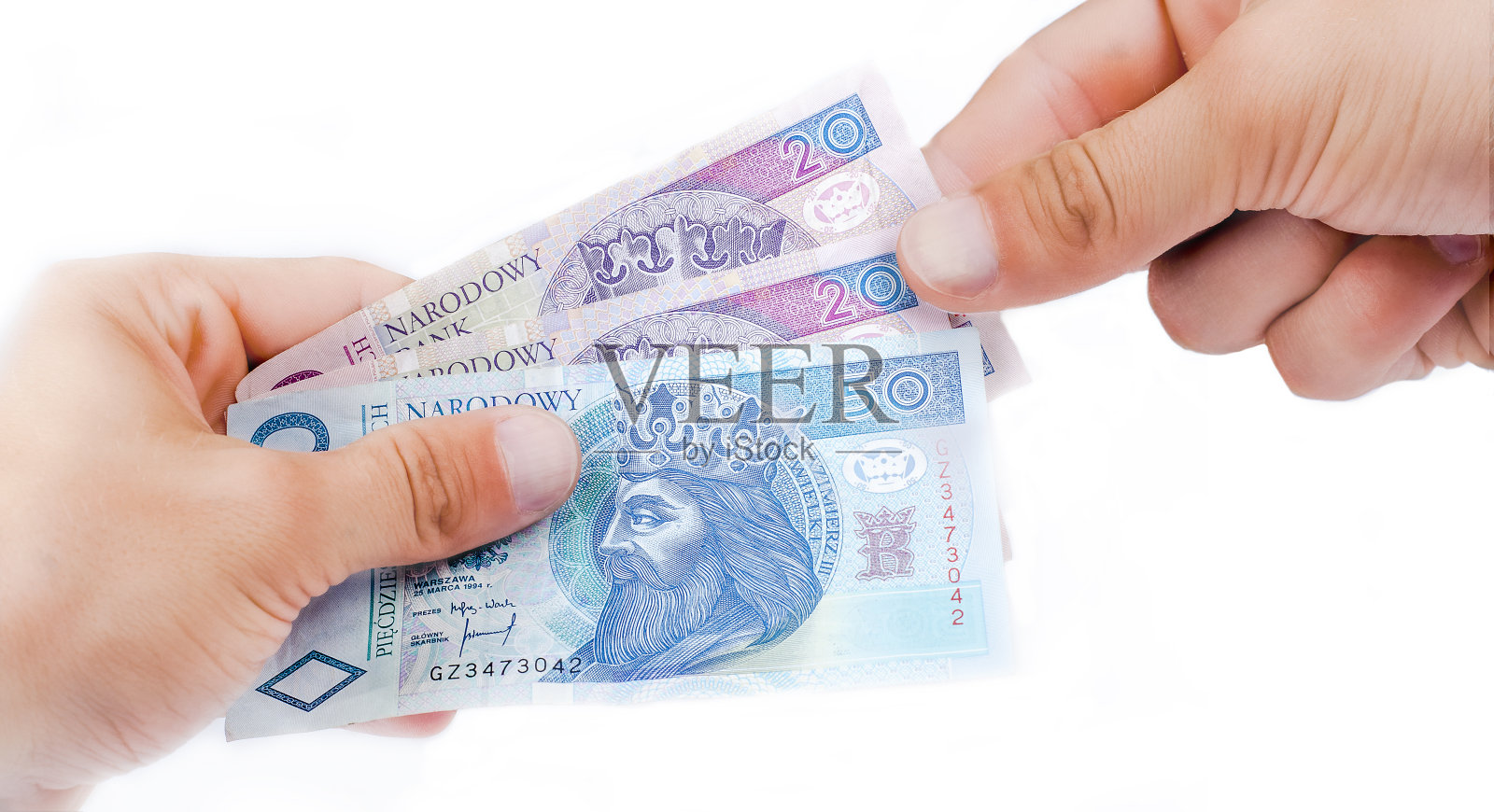 手中的波兰兹罗提纸币照片摄影图片