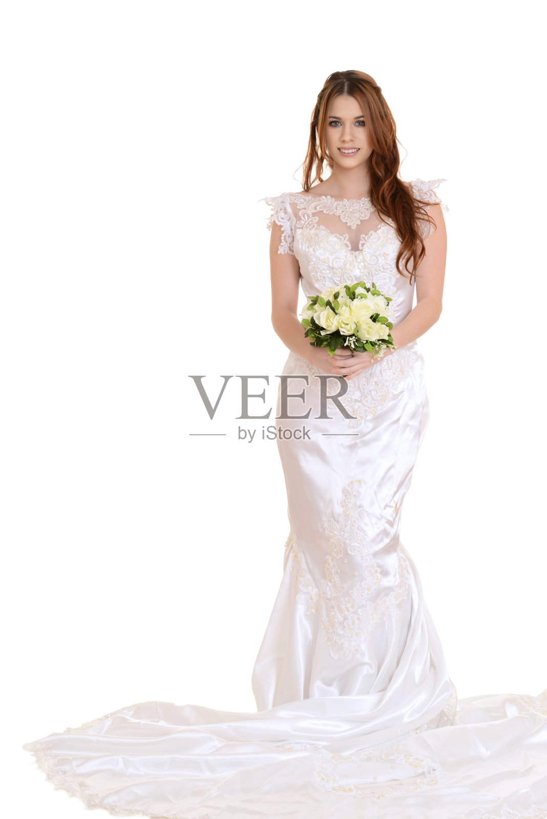 孤立的新娘拿着花束站在那里照片摄影图片