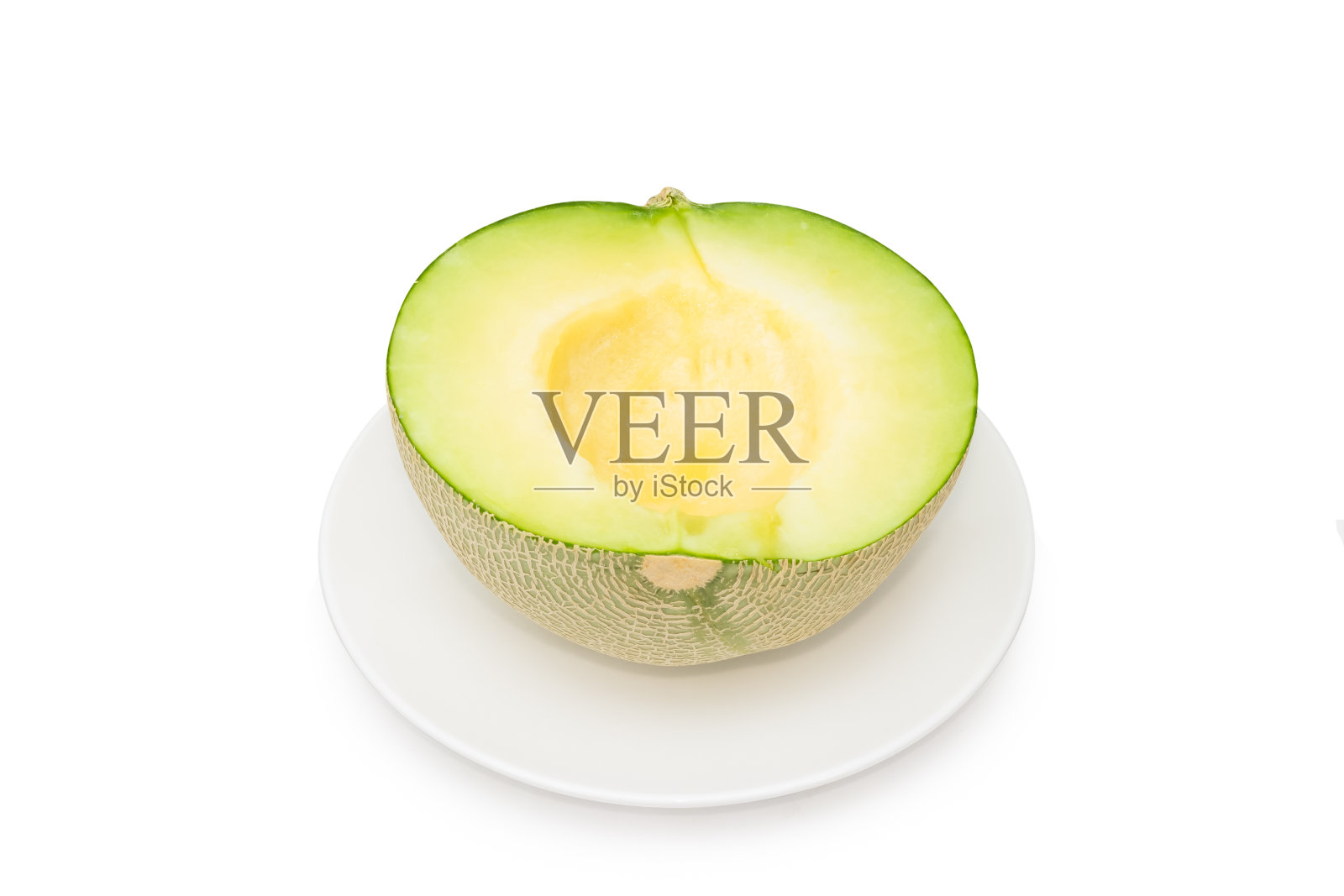 一半的哈密瓜孤立在白色背景上照片摄影图片