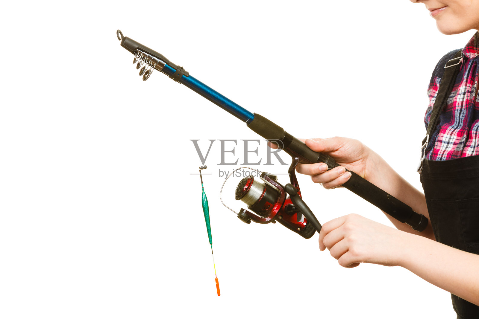 拿着鱼竿的女人照片摄影图片