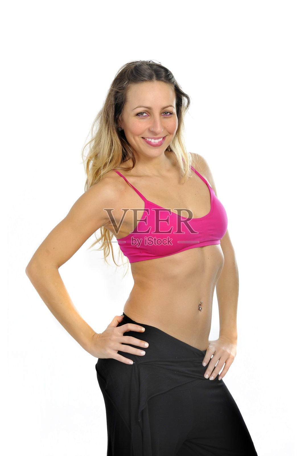 性感女人摆诱惑的运动胸罩健身概念照片摄影图片