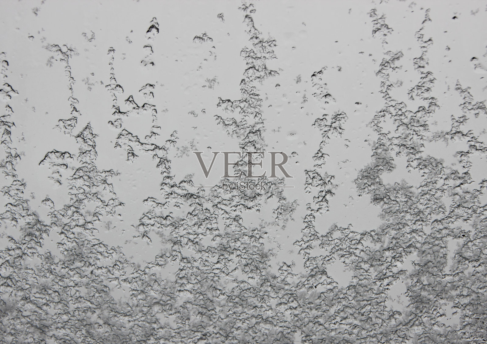 从窗户里面融化的雪背景照片摄影图片