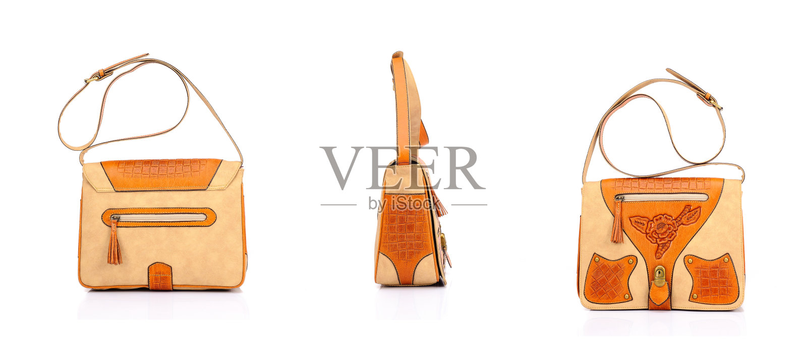 皮质女包在一个白色的背景照片摄影图片