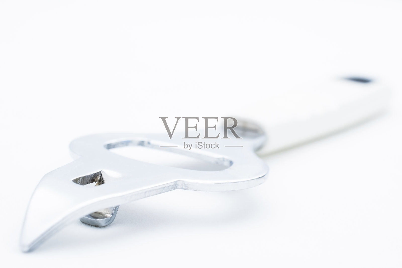 开瓶器宏在白色背景照片摄影图片