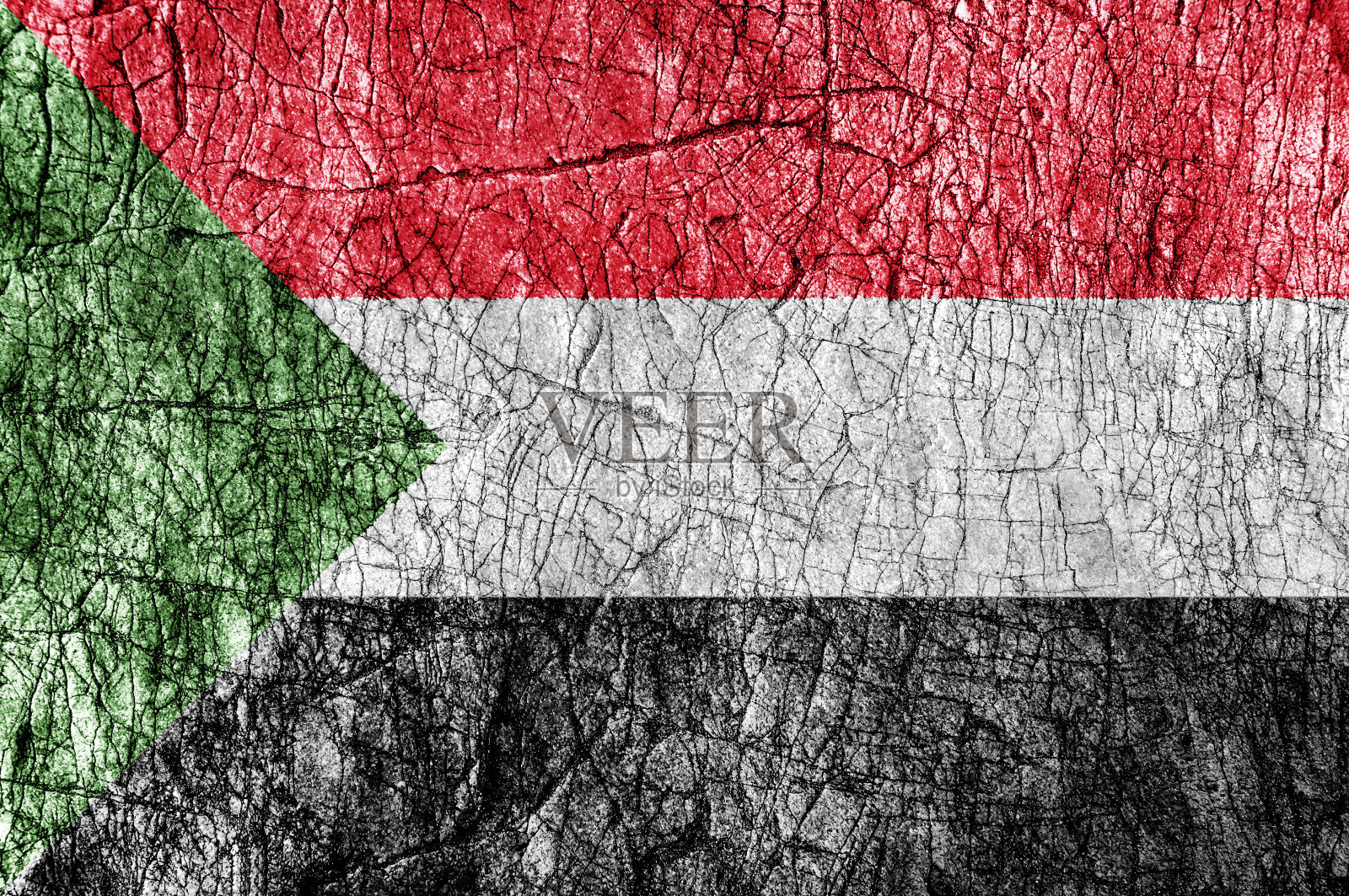 吝啬的石头涂上苏丹国旗照片摄影图片