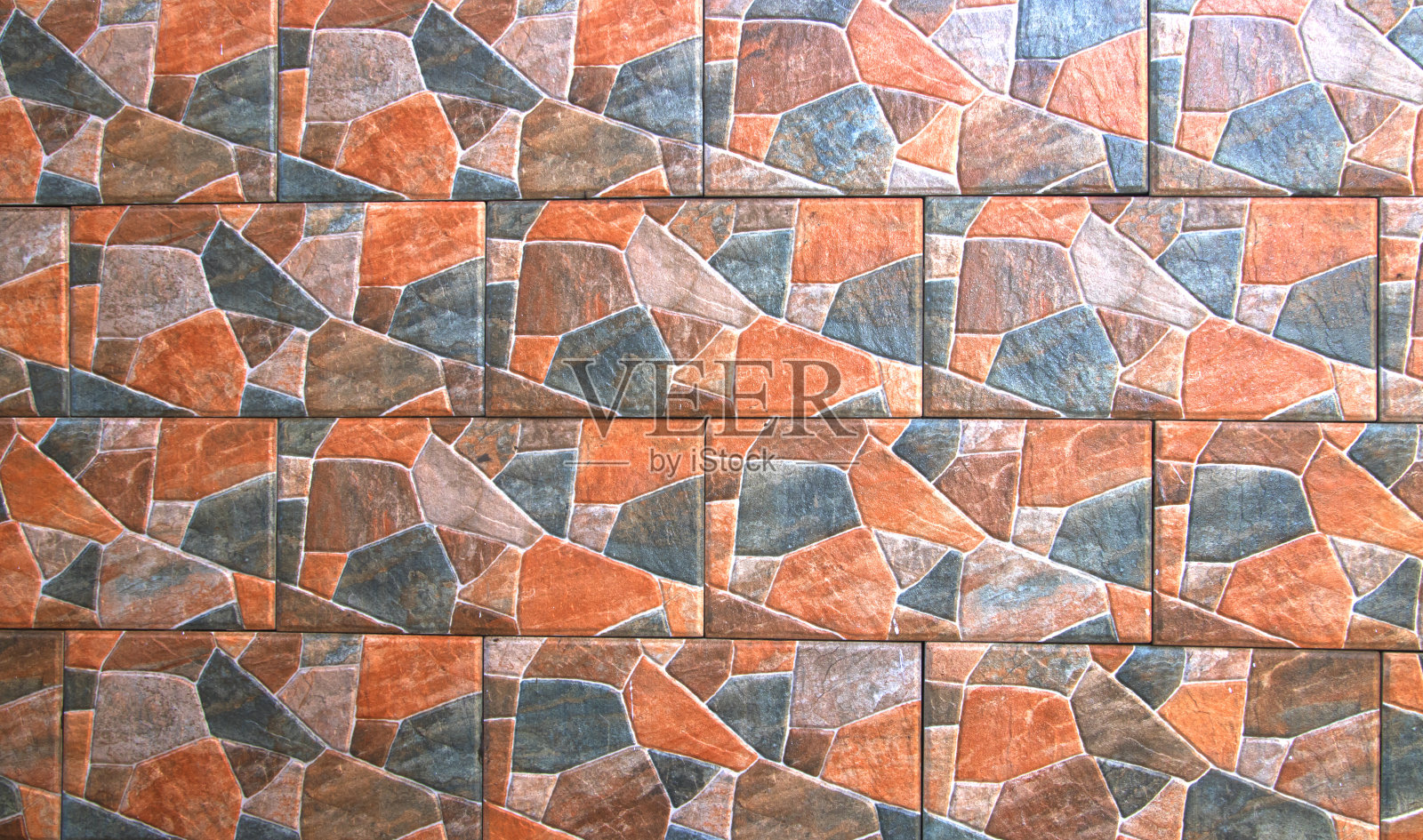 图案灰色现代风格设计，装饰凹凸不平的实石墙面用水泥开裂。照片摄影图片