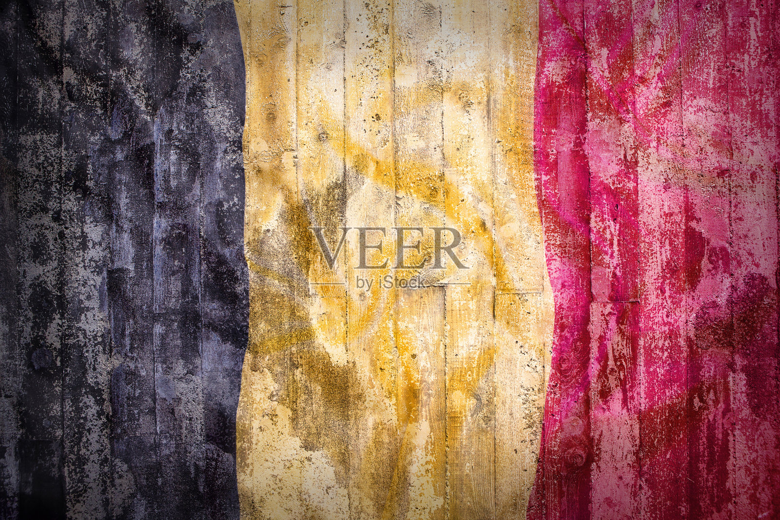 砖墙上的比利时国旗照片摄影图片