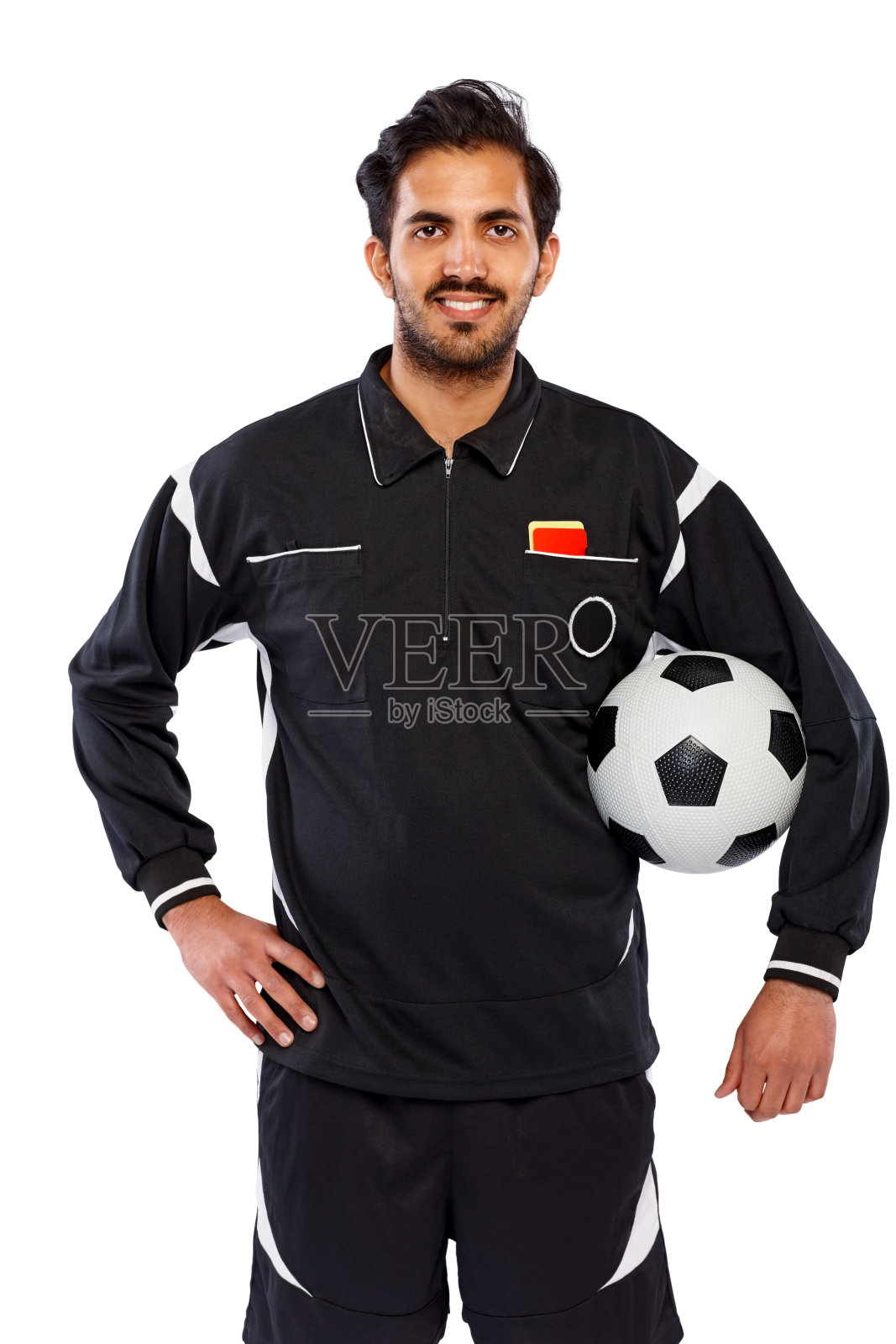 快乐的年轻足球裁判拿着一个足球照片摄影图片