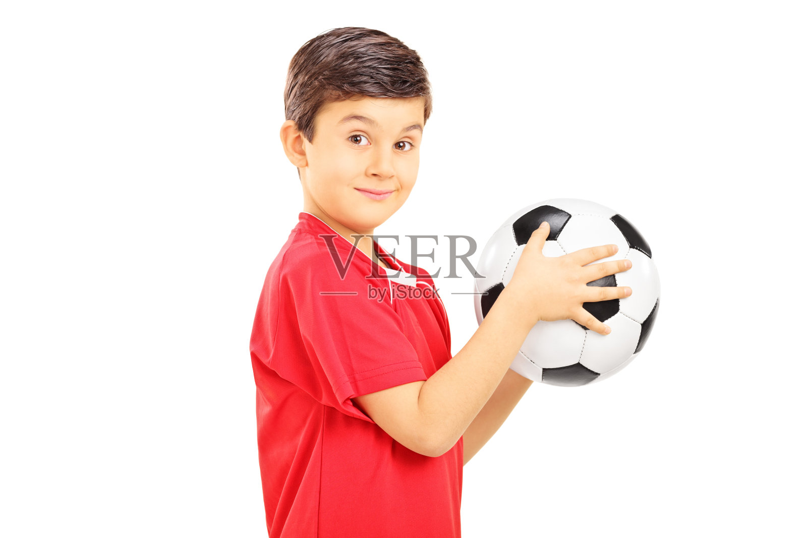 小男孩拿着一个足球照片摄影图片