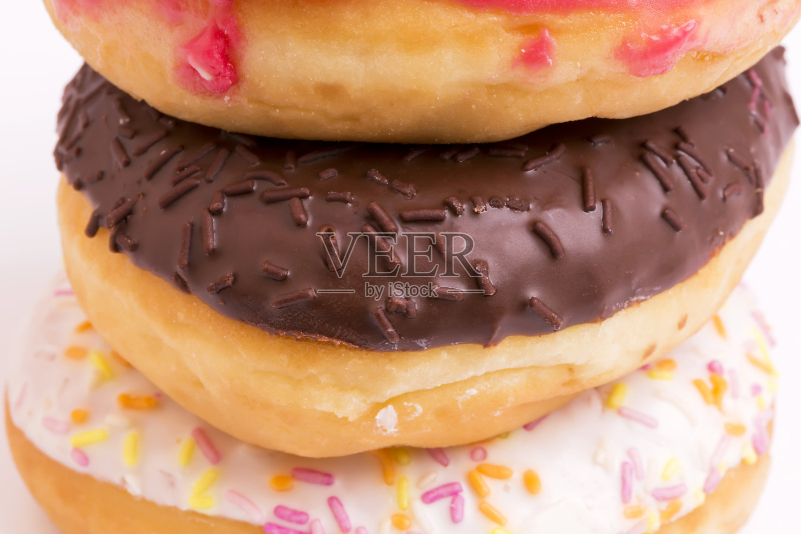 彩色背景烤甜甜圈照片摄影图片