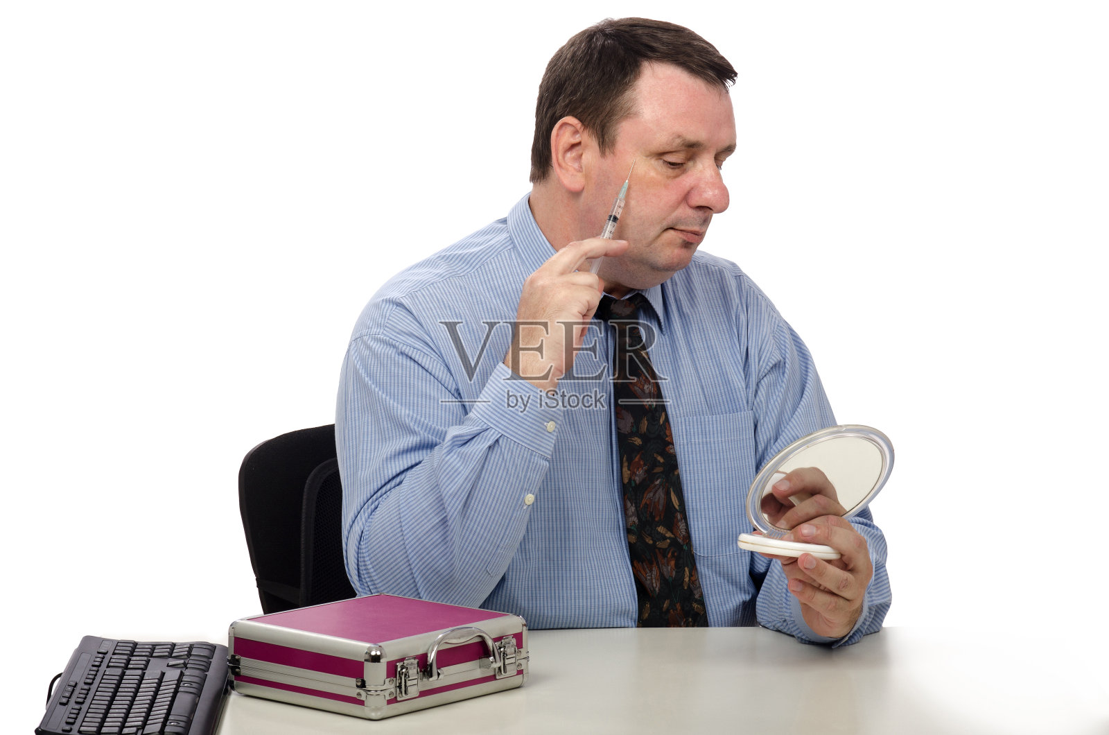 办公室职员正在打肉毒杆菌照片摄影图片