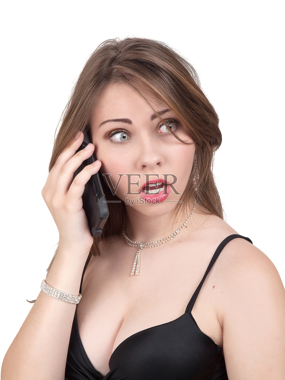 年轻性感的女人在打电话照片摄影图片