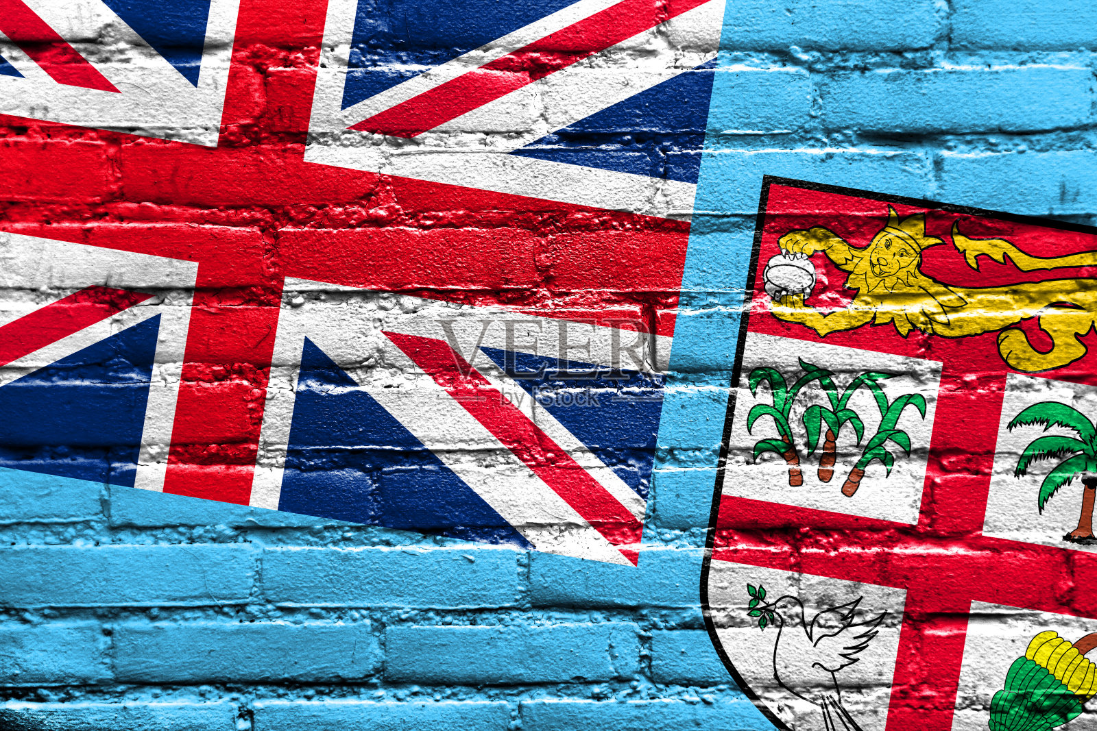砖墙上画着斐济国旗照片摄影图片