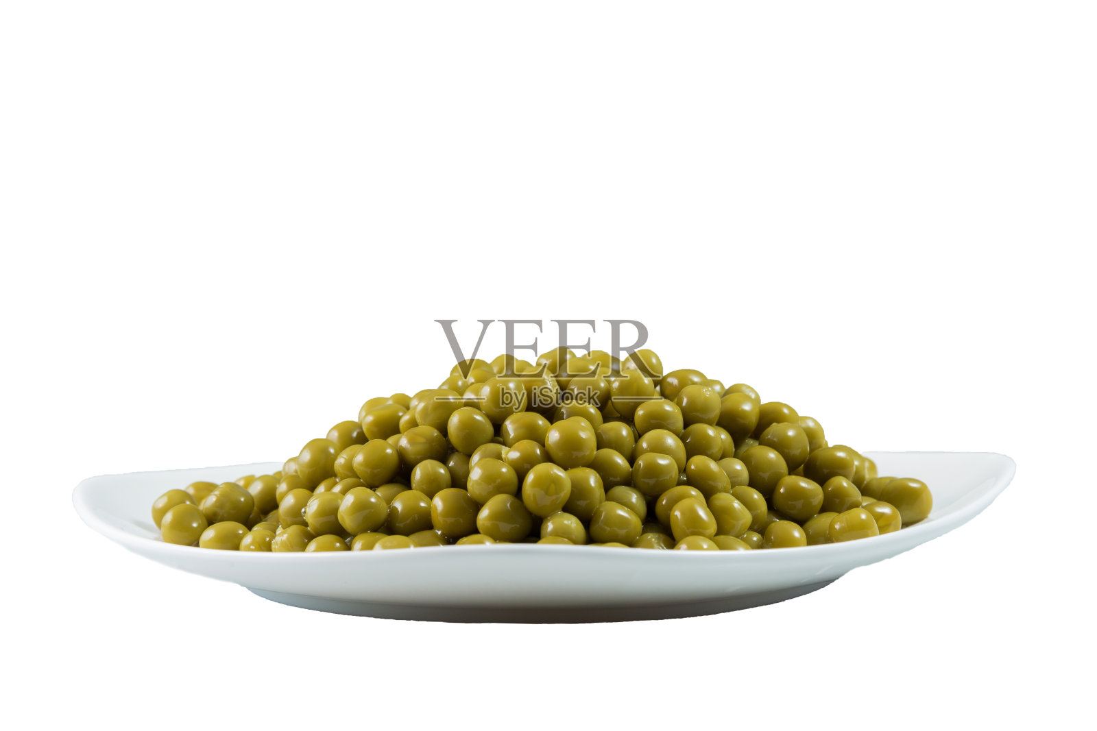 一碗孤立的冷冻绿豌豆照片摄影图片