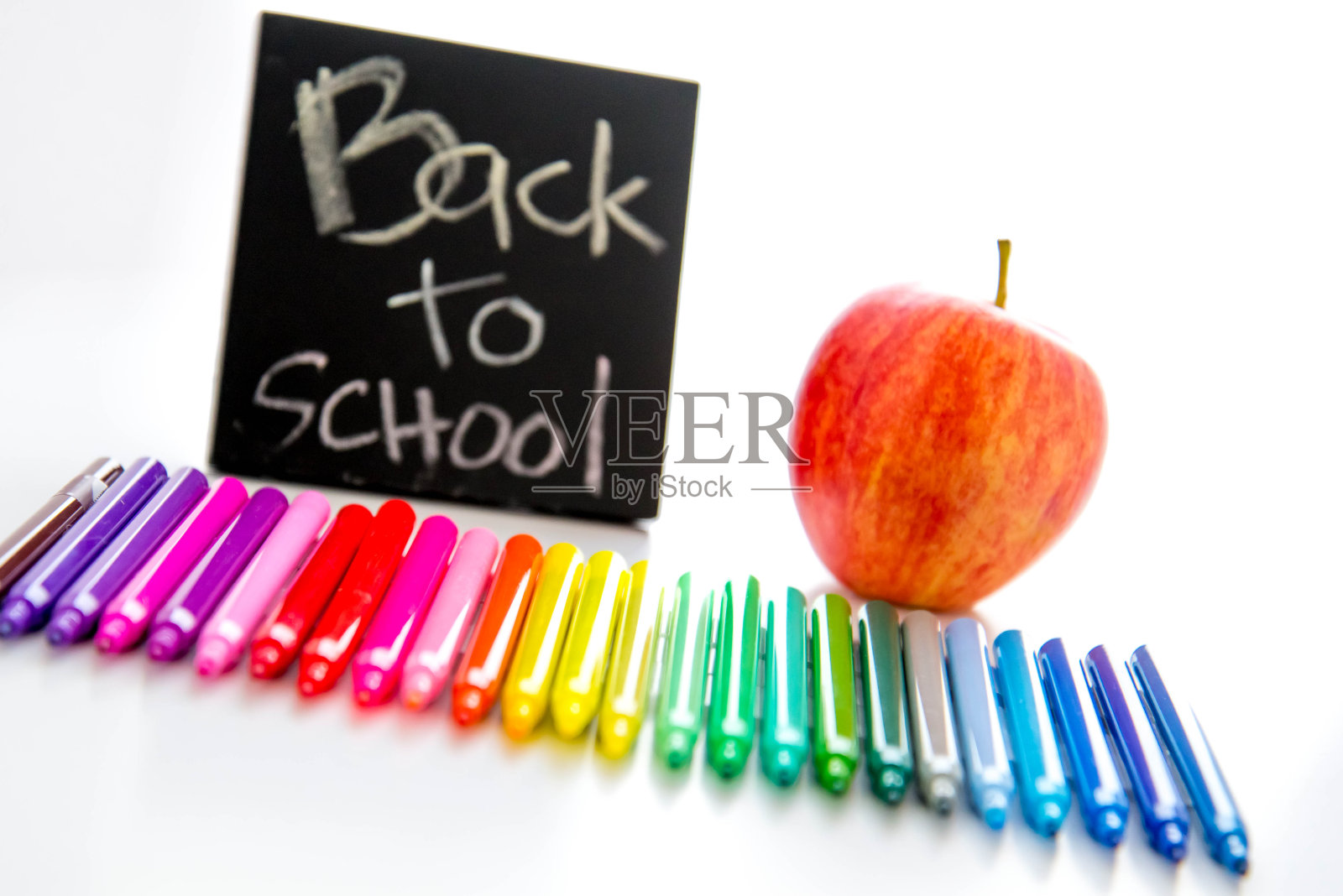 回到学校，给老师买个苹果照片摄影图片