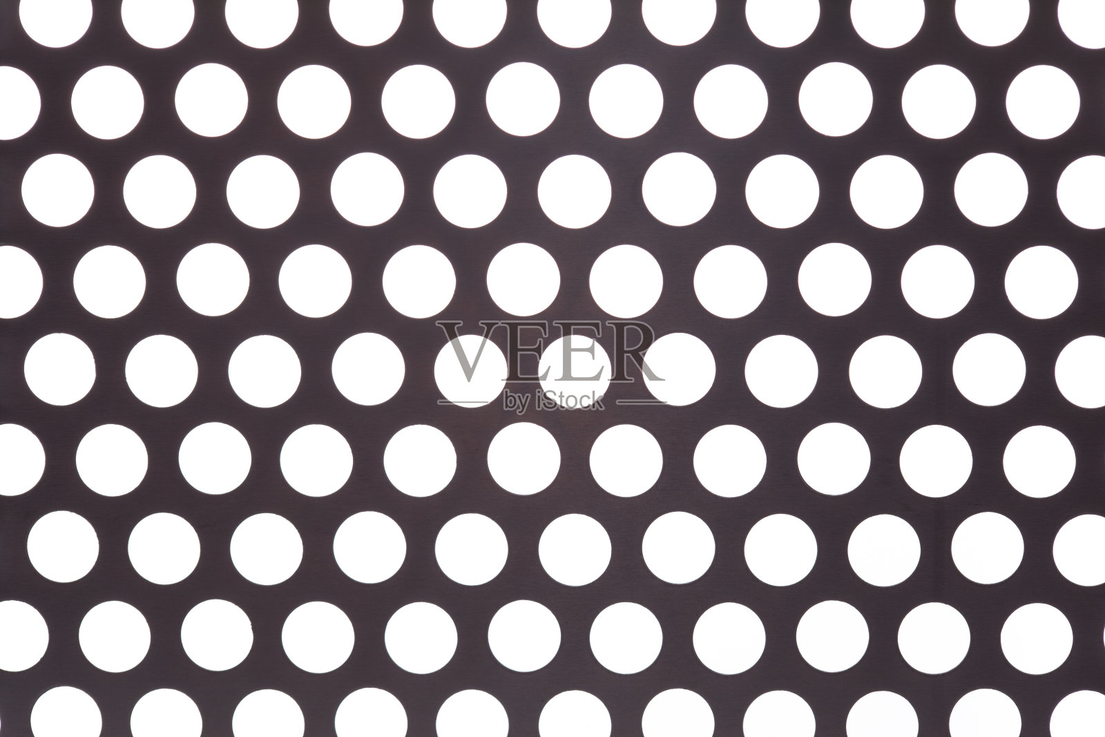 金属背景带孔照片摄影图片