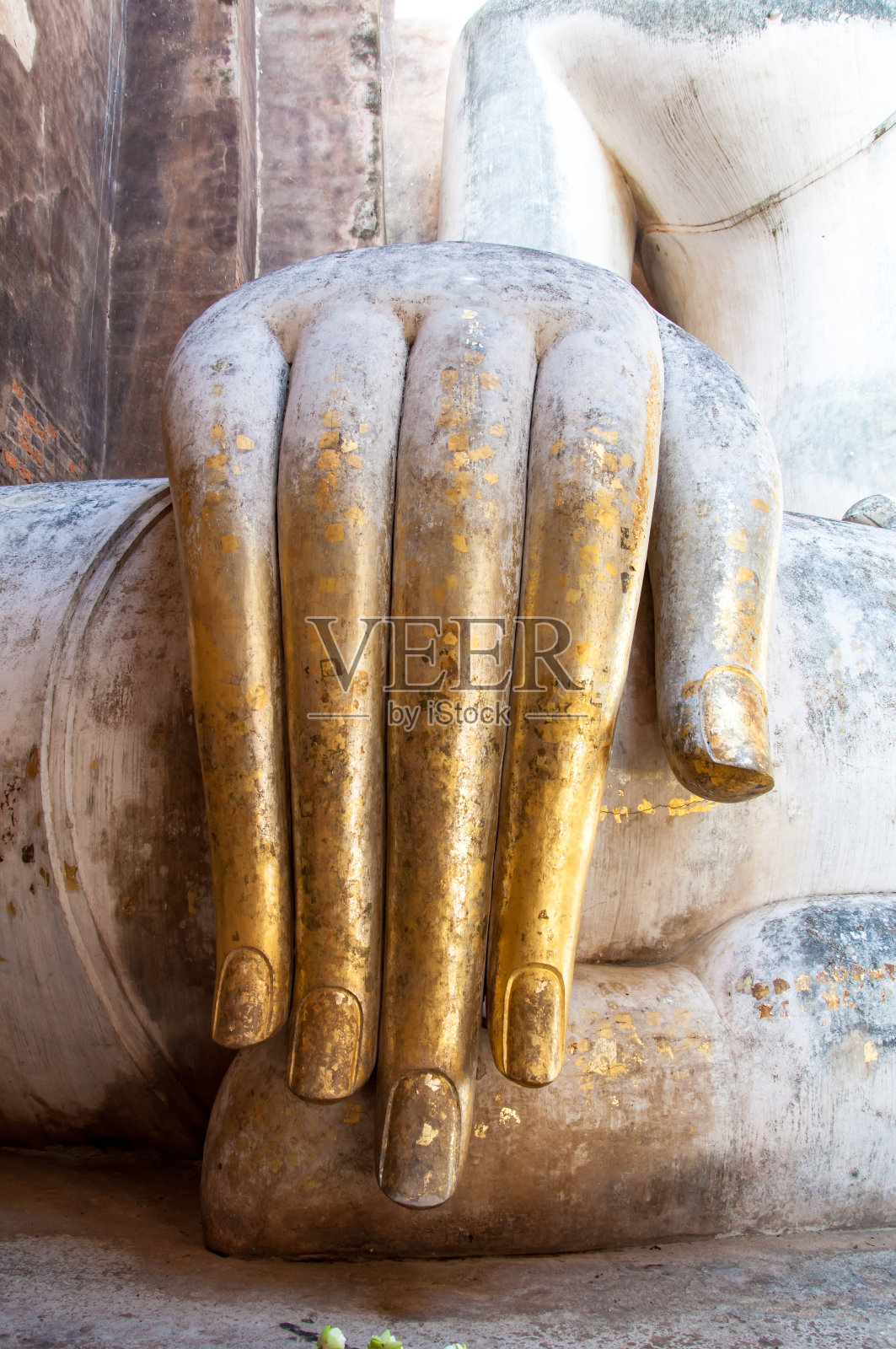 合上古佛之手。照片摄影图片