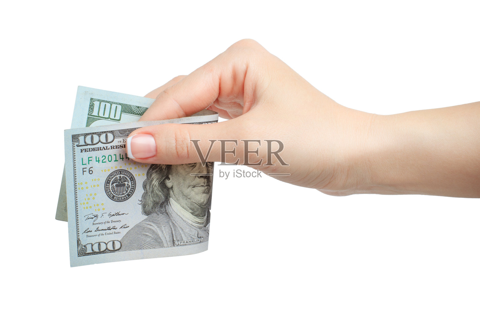 女人修指甲的手拿着100美元孤立在白色的背景照片摄影图片