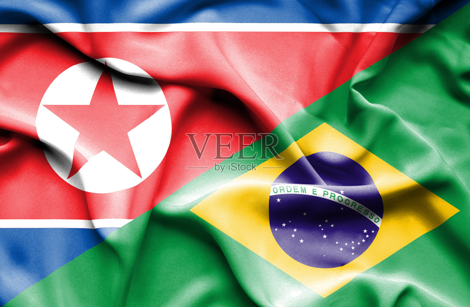 挥舞着巴西和朝鲜的旗帜照片摄影图片