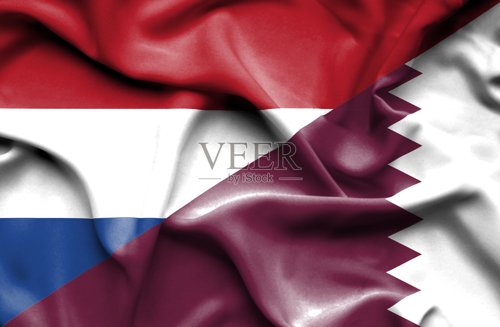 飘扬的卡塔尔和荷兰国旗照片摄影图片