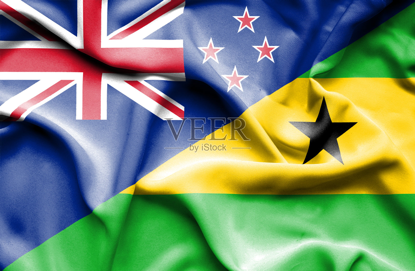 挥舞着圣多美、普林西比和新西兰国旗照片摄影图片