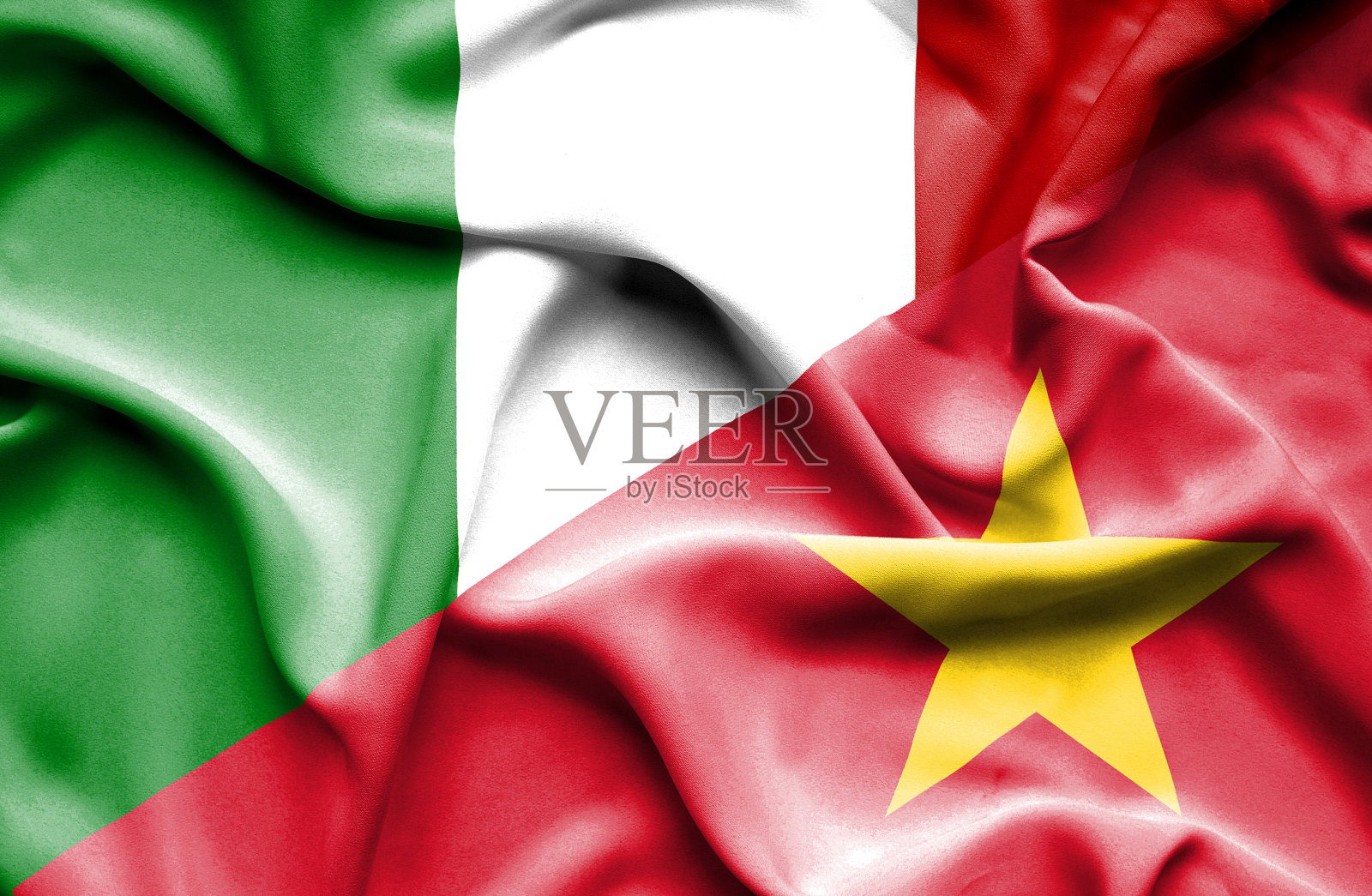 挥舞着越南和意大利的旗帜照片摄影图片