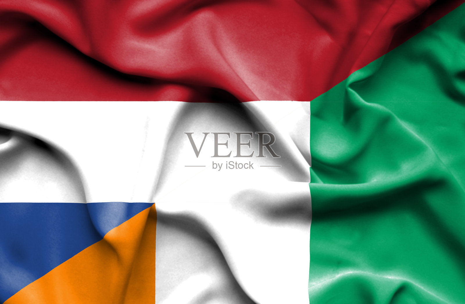 挥舞着象牙海岸和荷兰的旗帜照片摄影图片