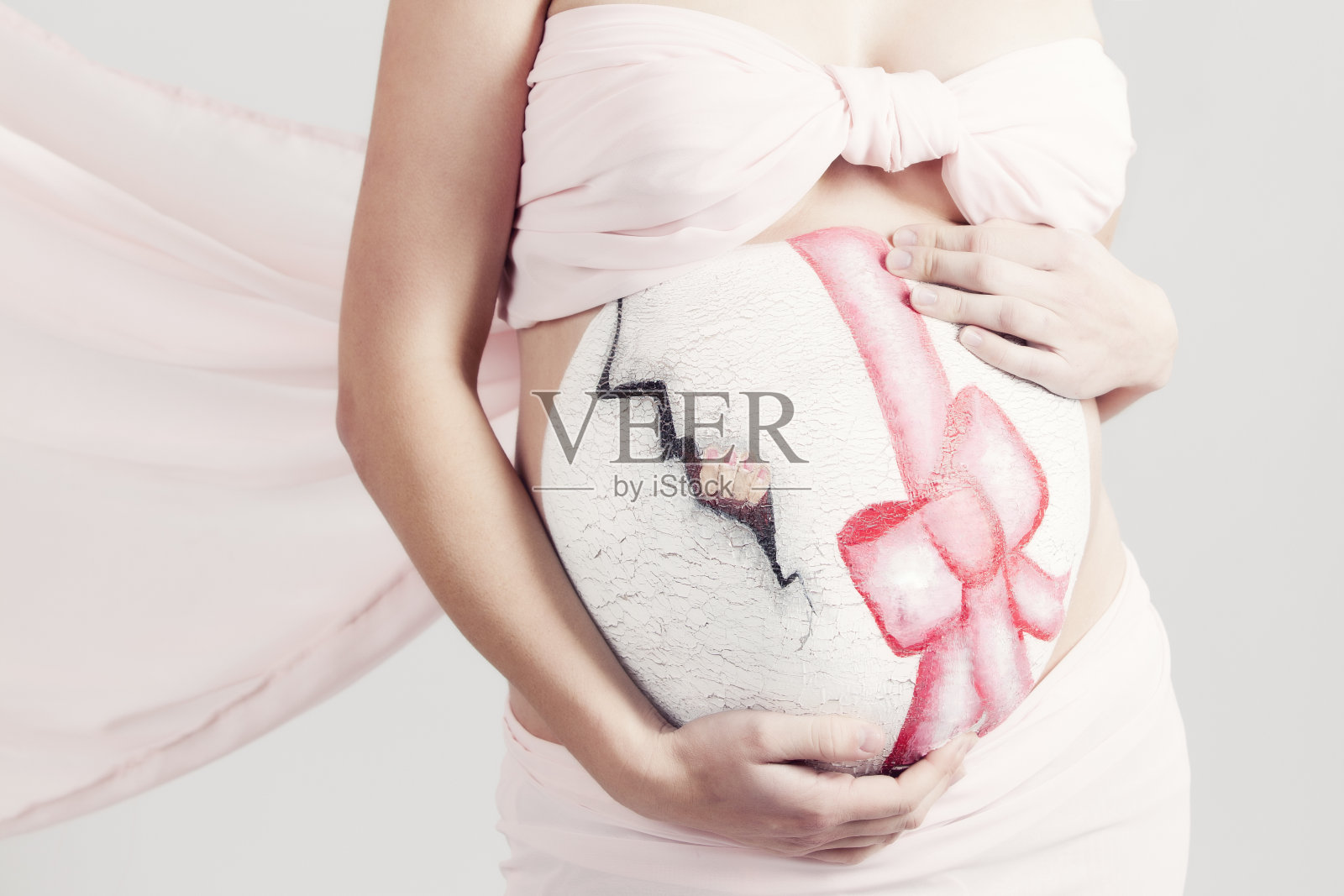 腹部艺术:画孕妇的腹部照片摄影图片