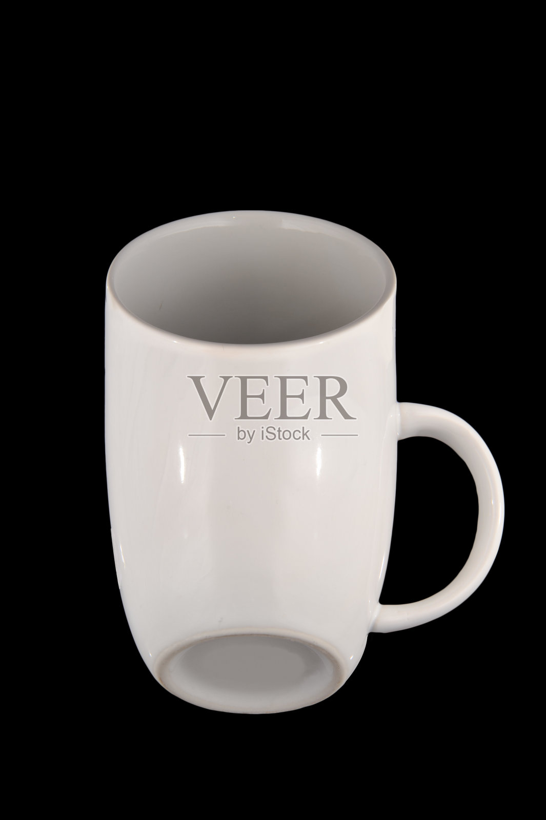 带把手的咖啡杯的不可能视角照片摄影图片