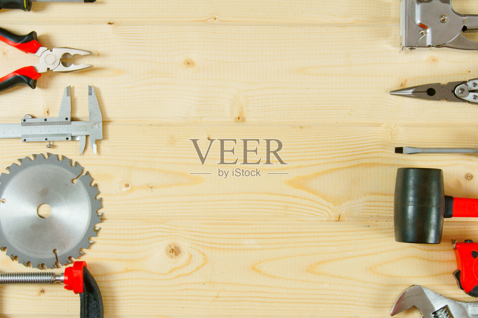 木制背景上的许多工作工具照片摄影图片