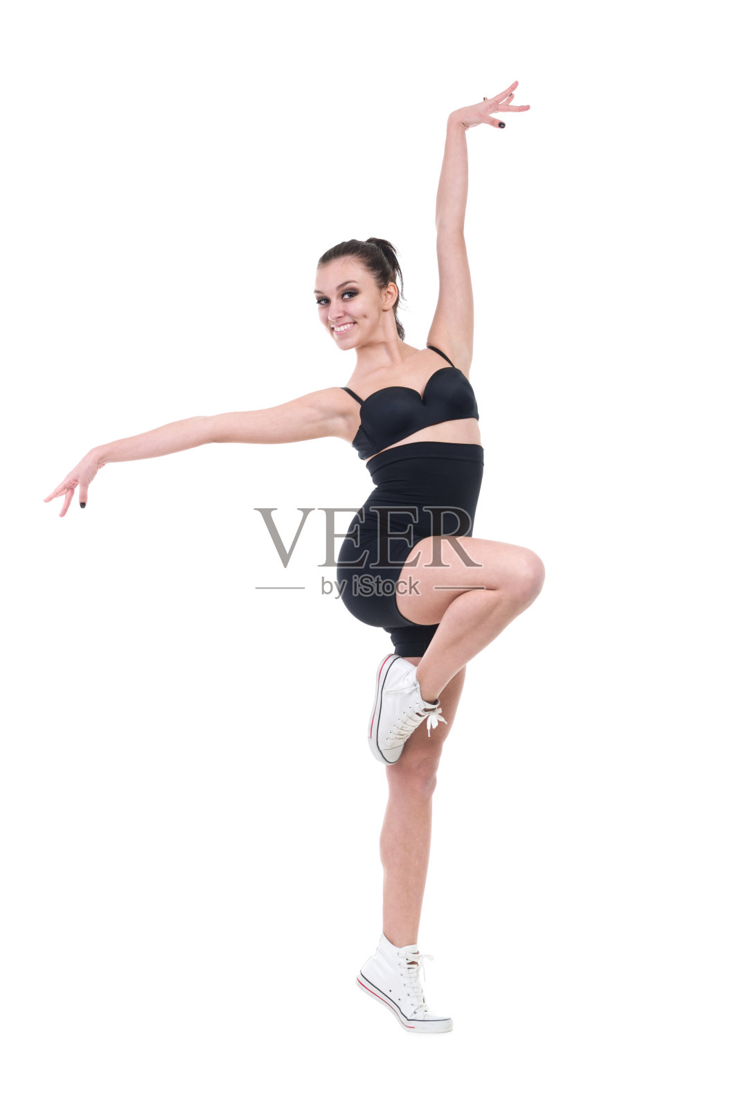 年轻的健身妇女做运动照片摄影图片