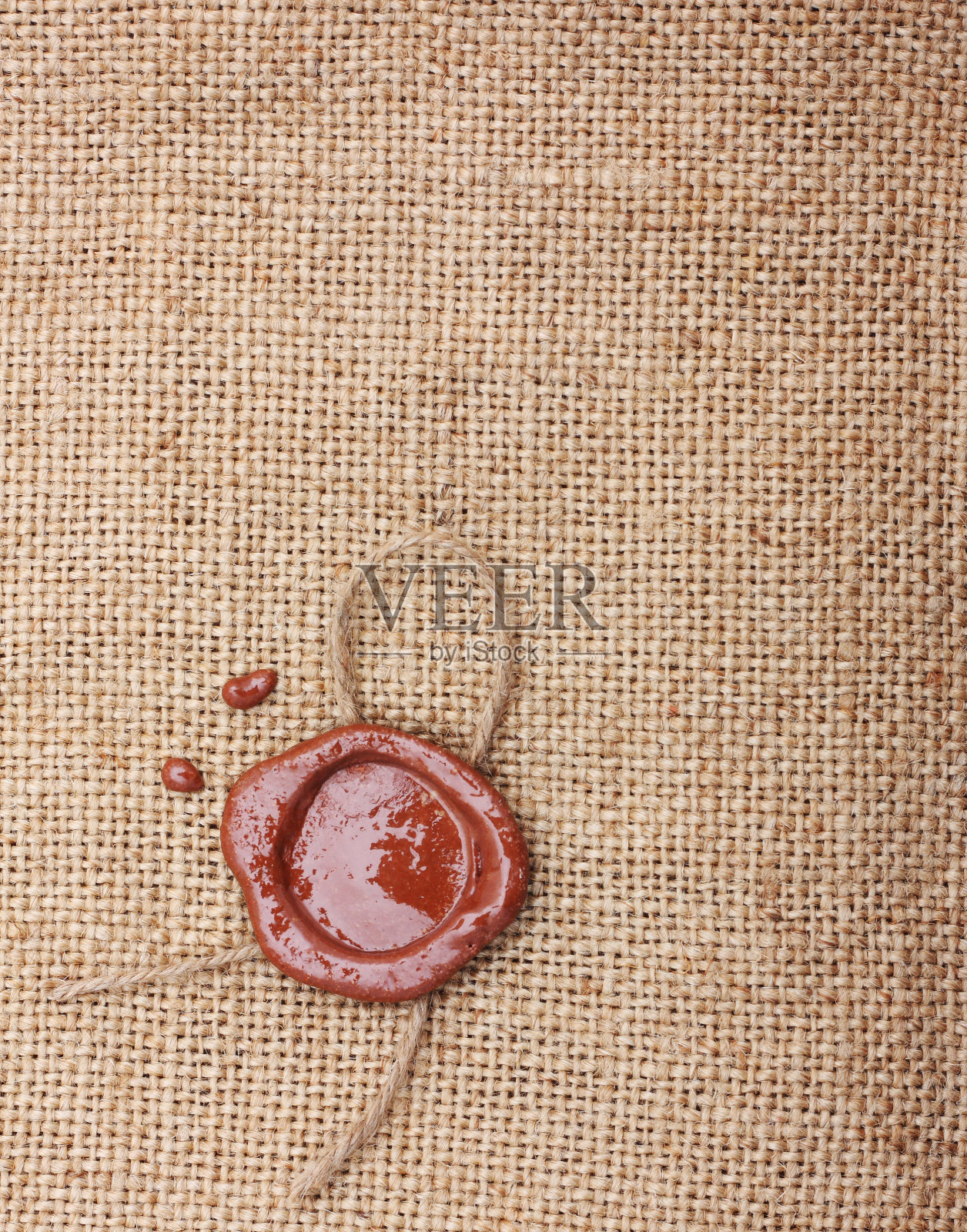 有蜡封的粗麻布袋。照片摄影图片