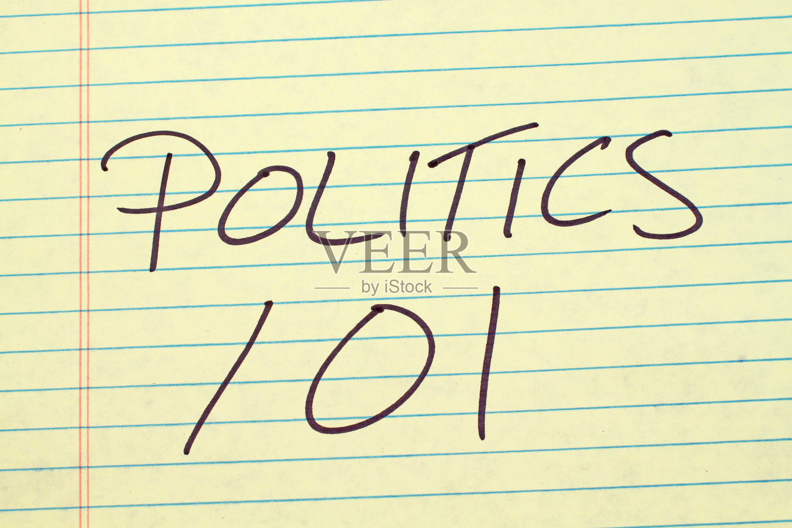 政治101在黄色拍纸簿上照片摄影图片