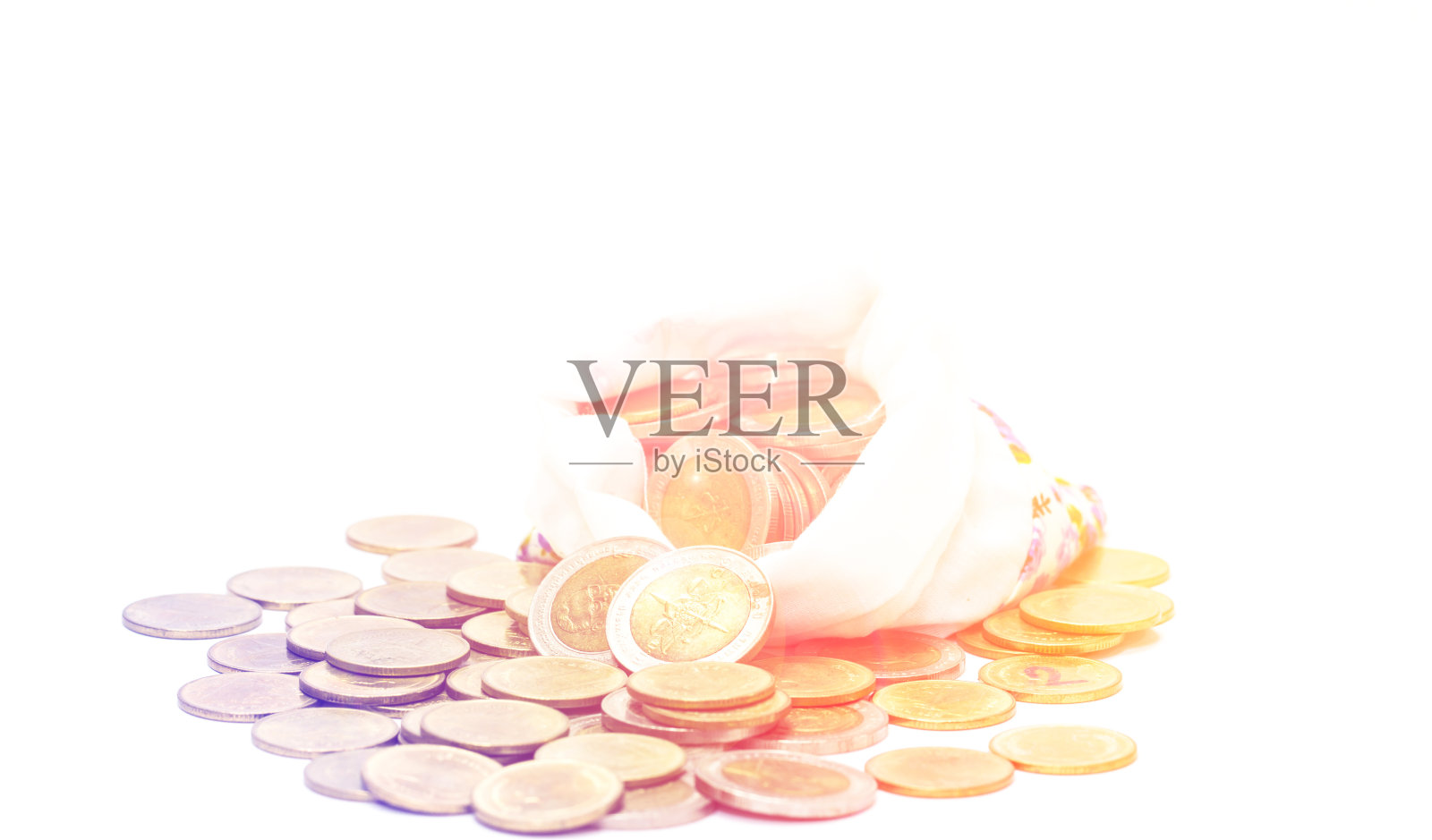 装着旧硬币的亚麻袋子照片摄影图片