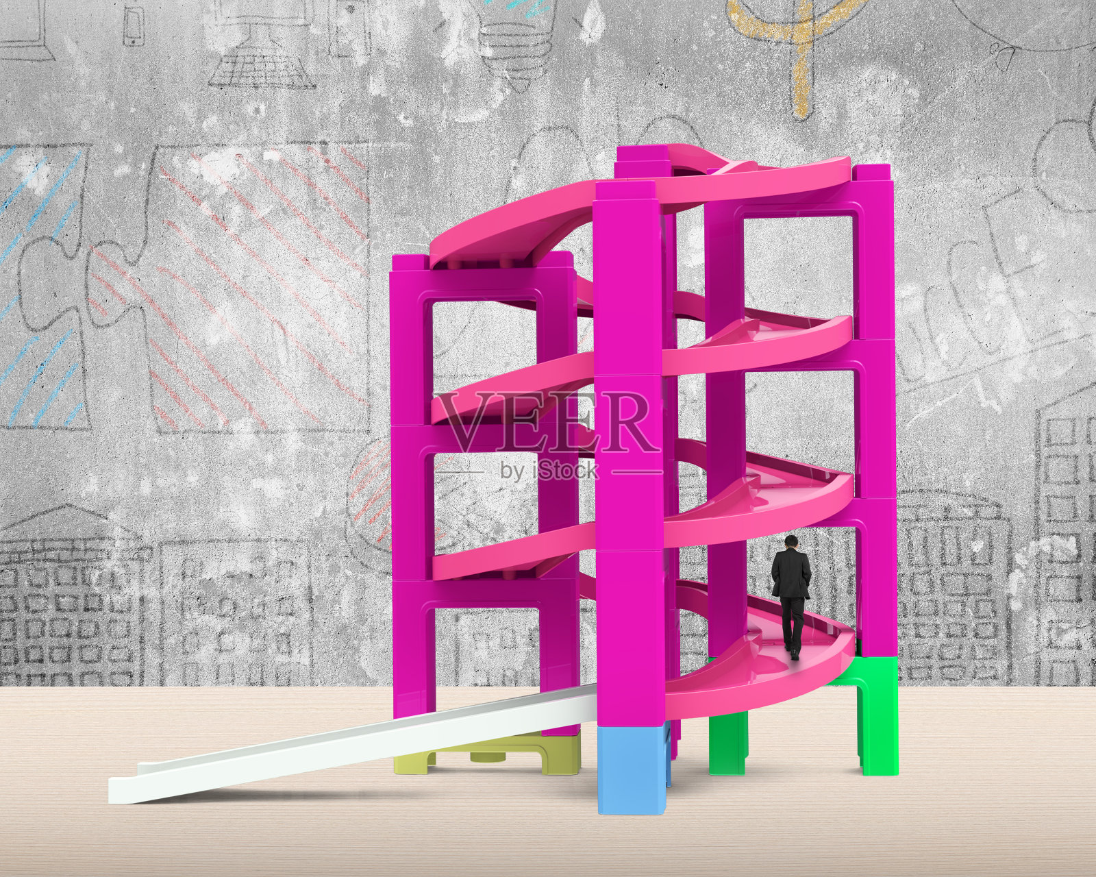 人在堆垛块中未完工的螺旋轨道上行走照片摄影图片