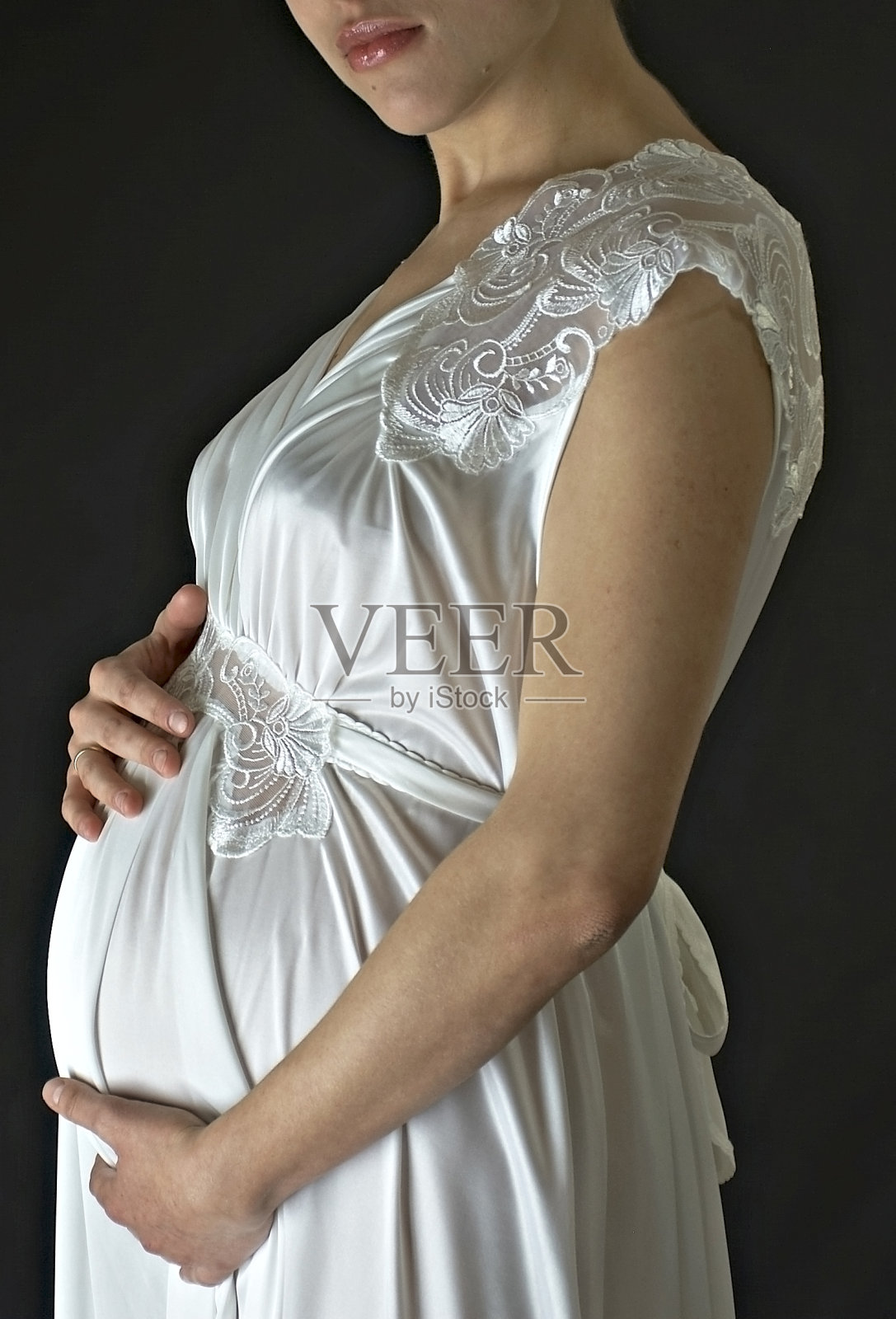 怀孕的母亲。照片摄影图片