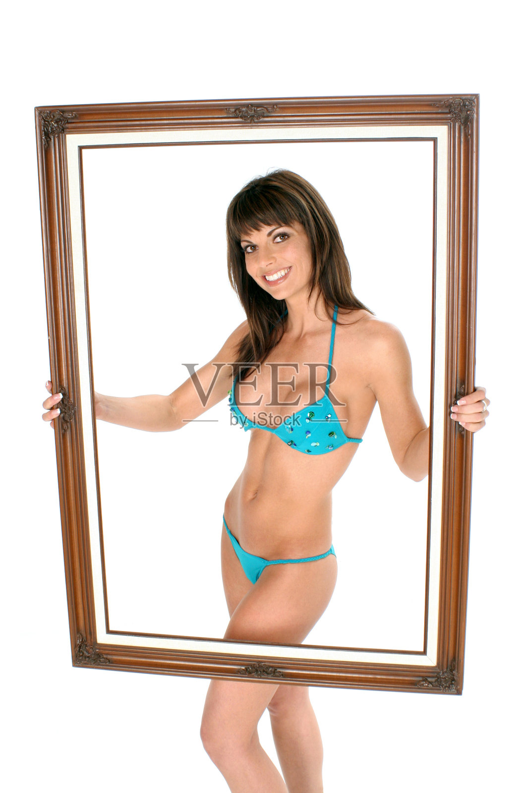 她穿着白色的比基尼照片摄影图片