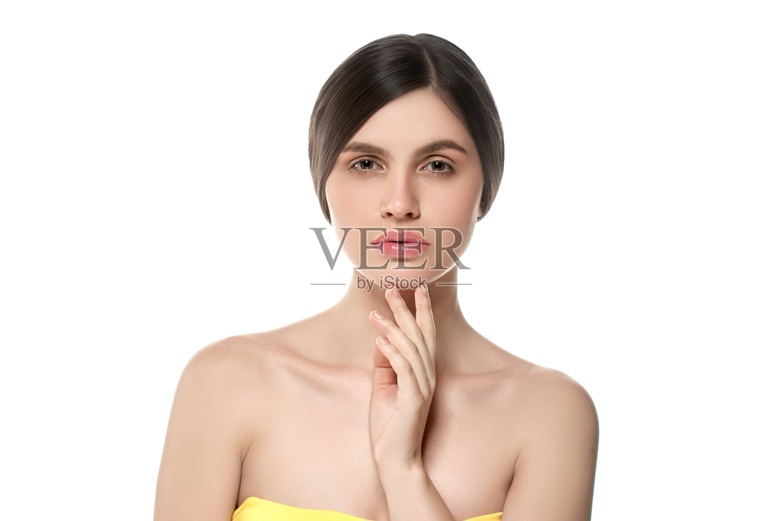 美丽的女人面部画像美丽的皮肤护理概念美丽的年轻女性模特女孩抚摸她的脸照片摄影图片