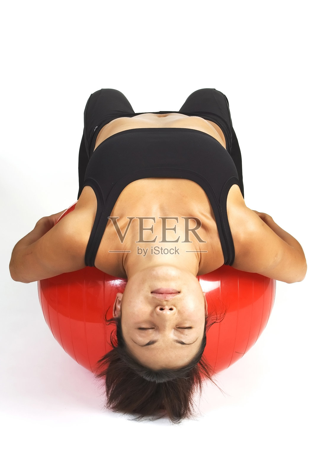 在Fitball 2上拉伸照片摄影图片