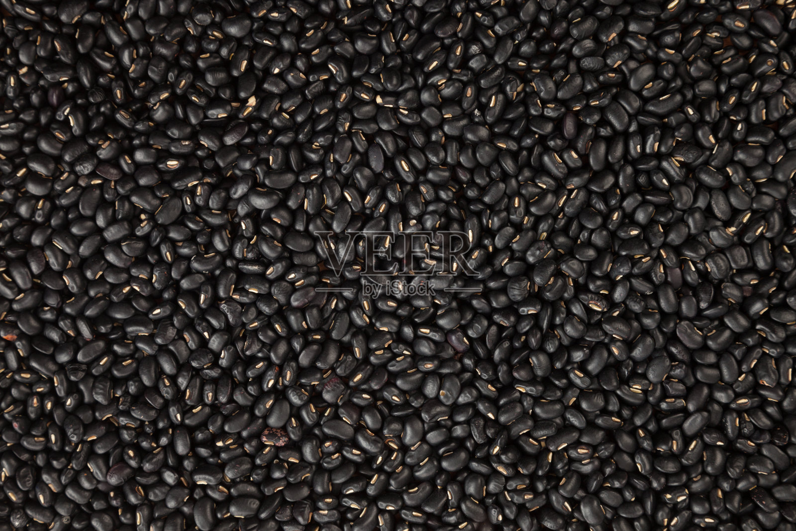 以黑豆为背景，质地照片摄影图片