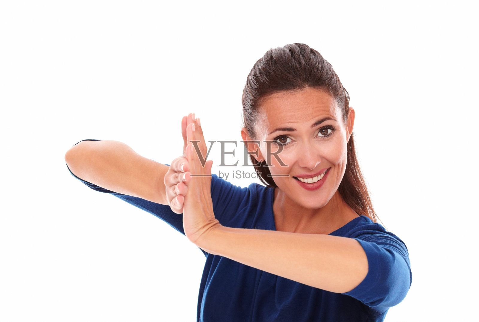 微笑的女士在胜利中鼓掌照片摄影图片