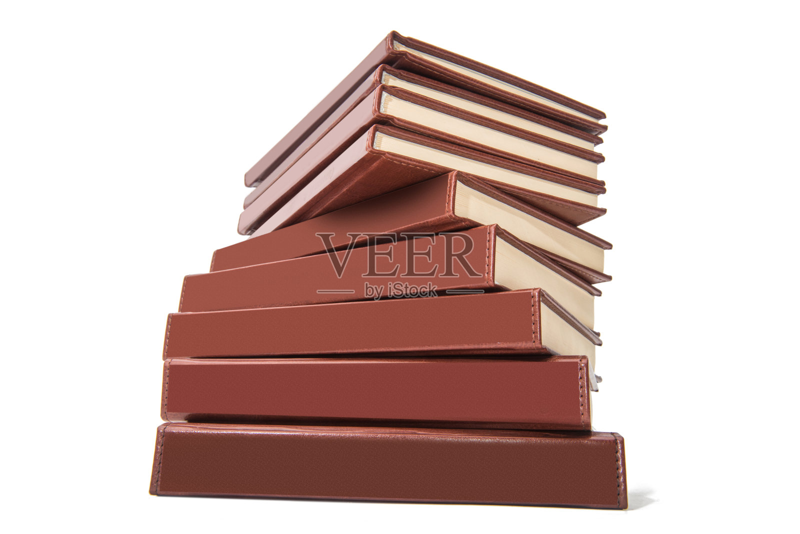 一大摞古书孤立在白色的背景上照片摄影图片