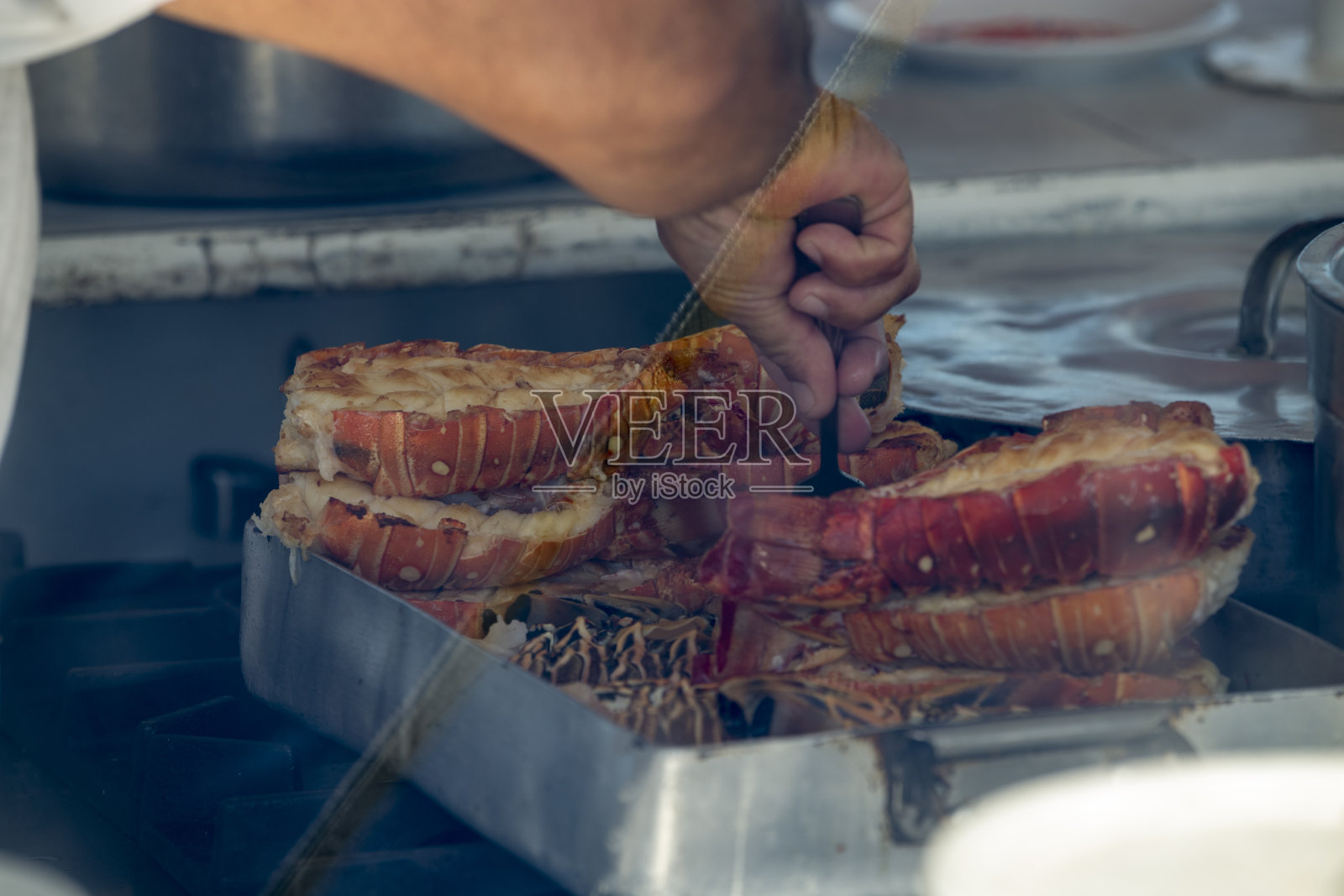 在古巴Cayo Largo烘焙龙虾尾照片摄影图片