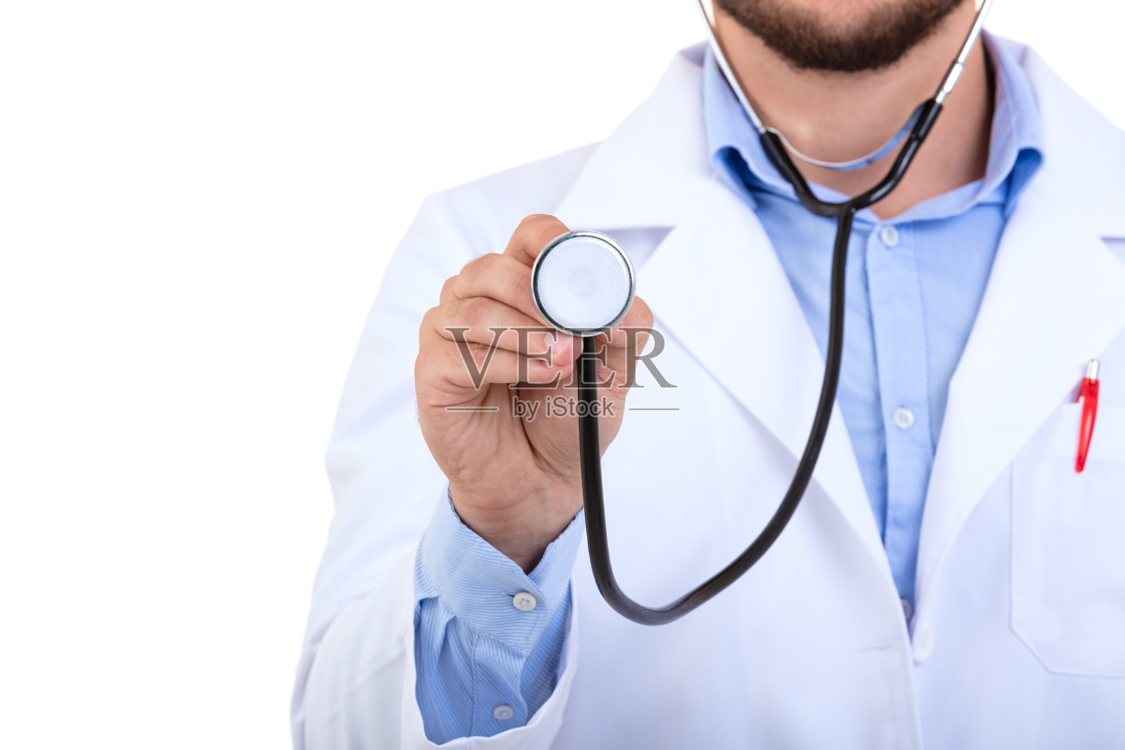 医生手里拿着听诊器照片摄影图片