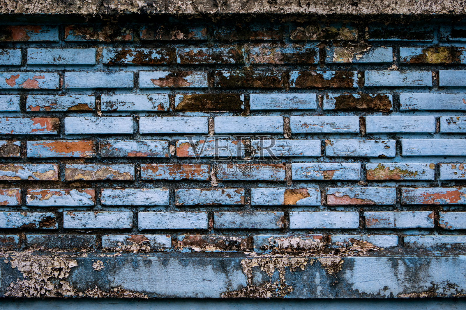 破旧的蓝色砖墙用作背景照片摄影图片
