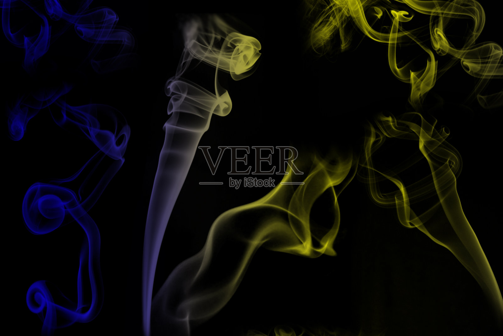 黄色和蓝色烟雾背景。照片摄影图片