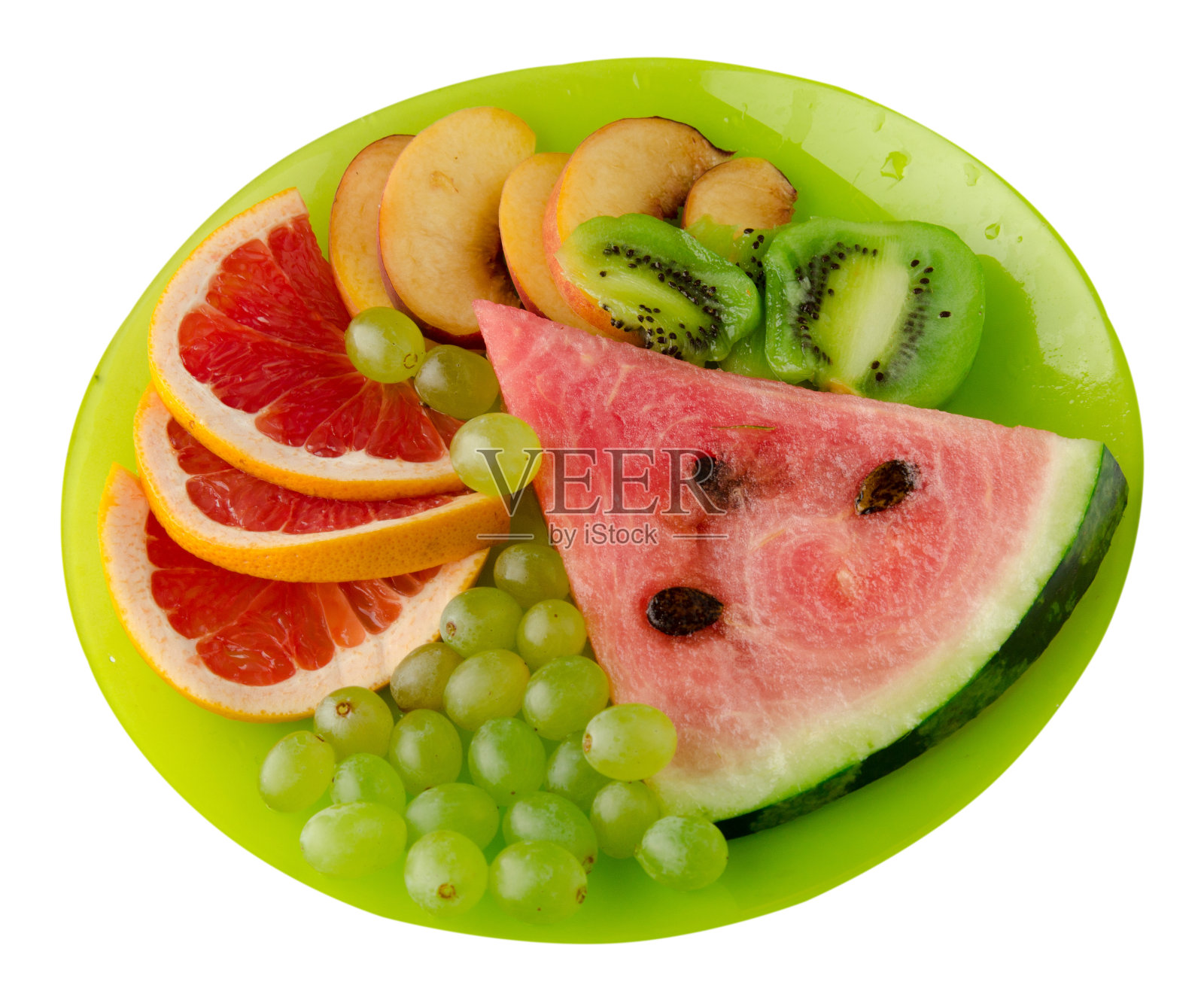 把水果切成片放在盘子里照片摄影图片